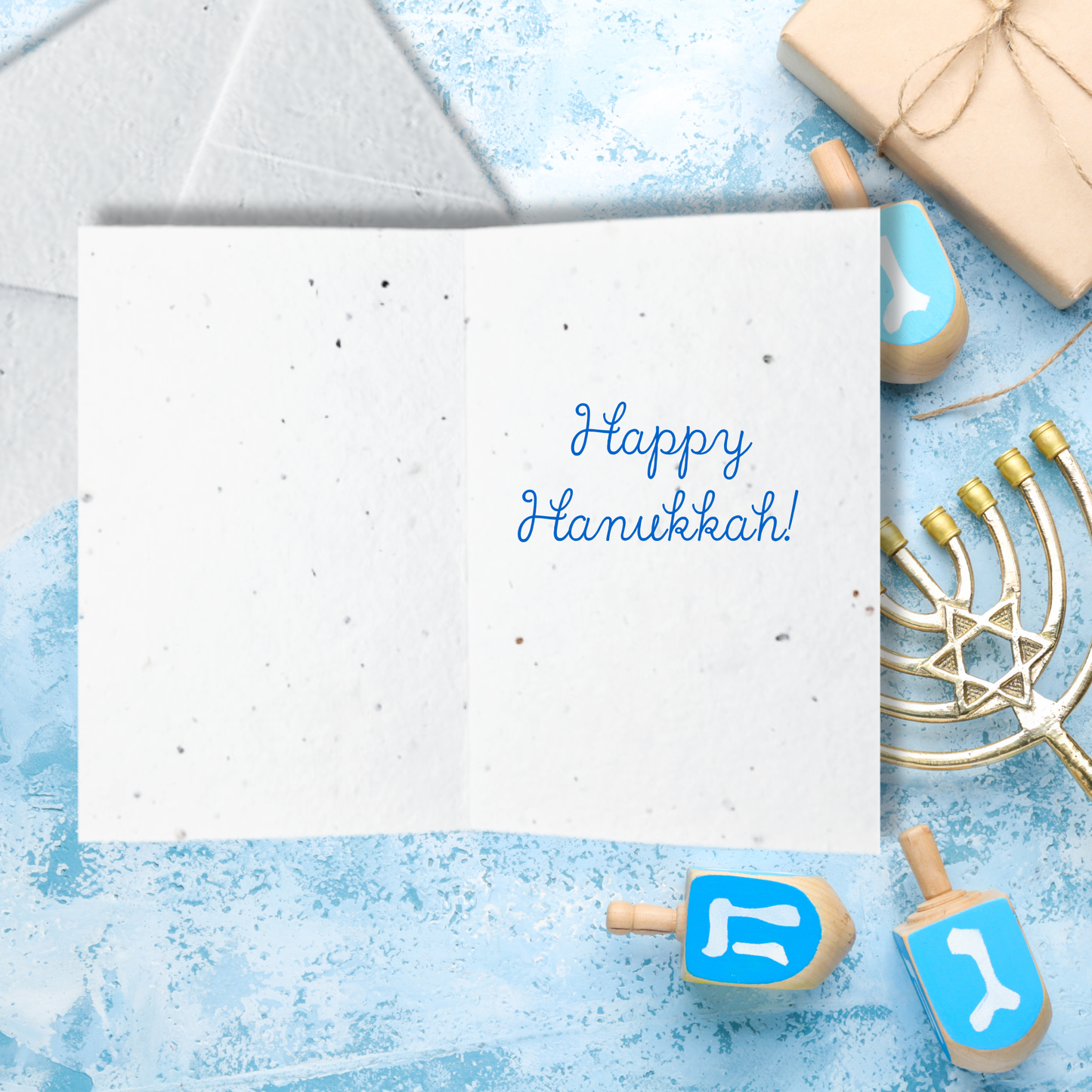 Happy Hanukkah text inside a card