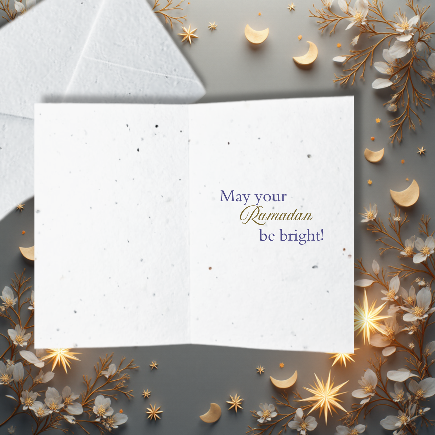 Greeting card with 'May your Ramadan be bright!' text, surrounded by decorative elements on a gray background.