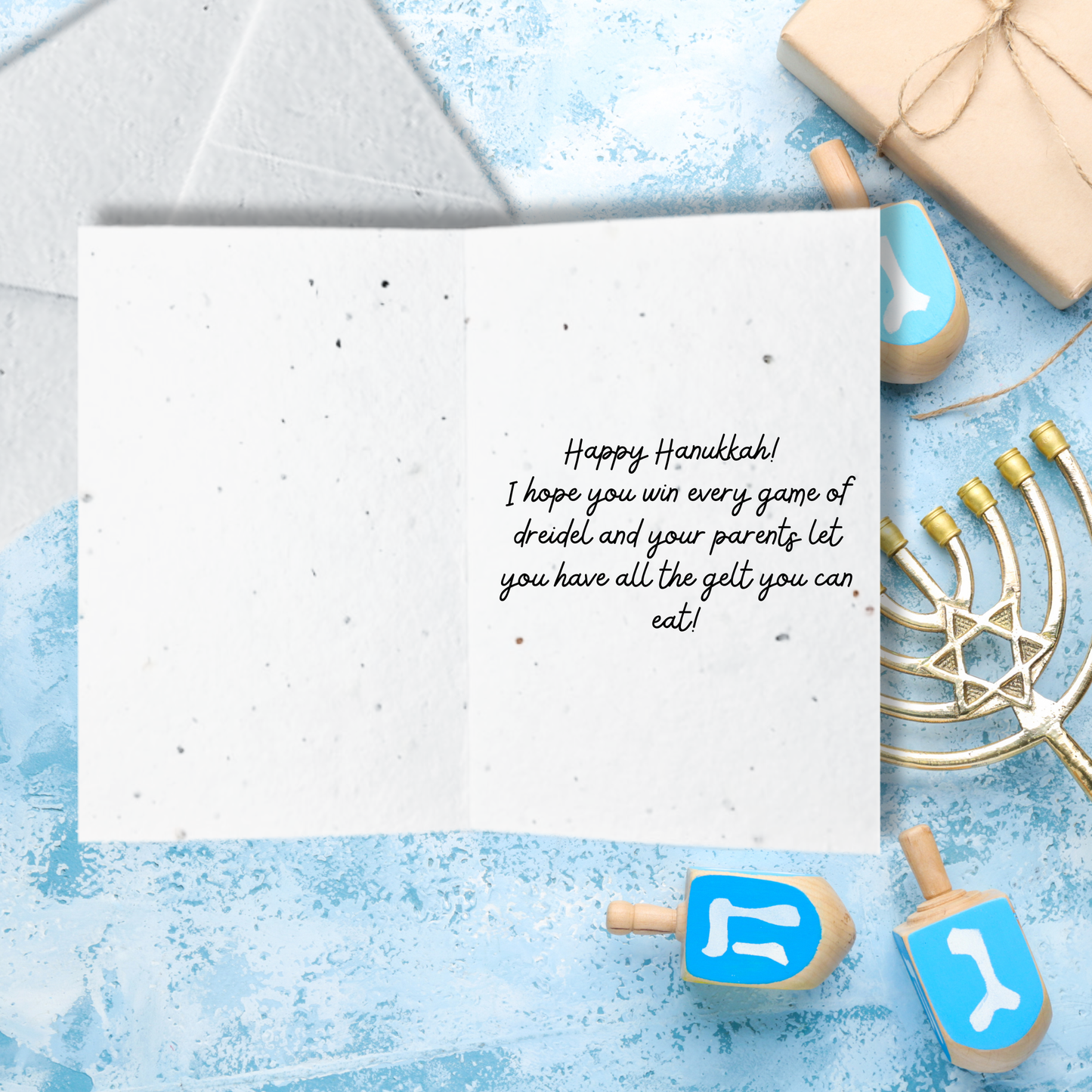Hanukkah card with text 'happy Hanukkah! I hope you win every game of dreidel and your parents let you have all the gelt you can eat'