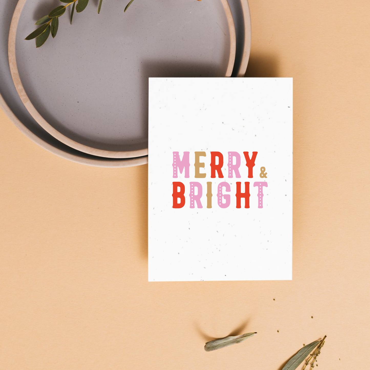 White card with 'Merry & Bright' text