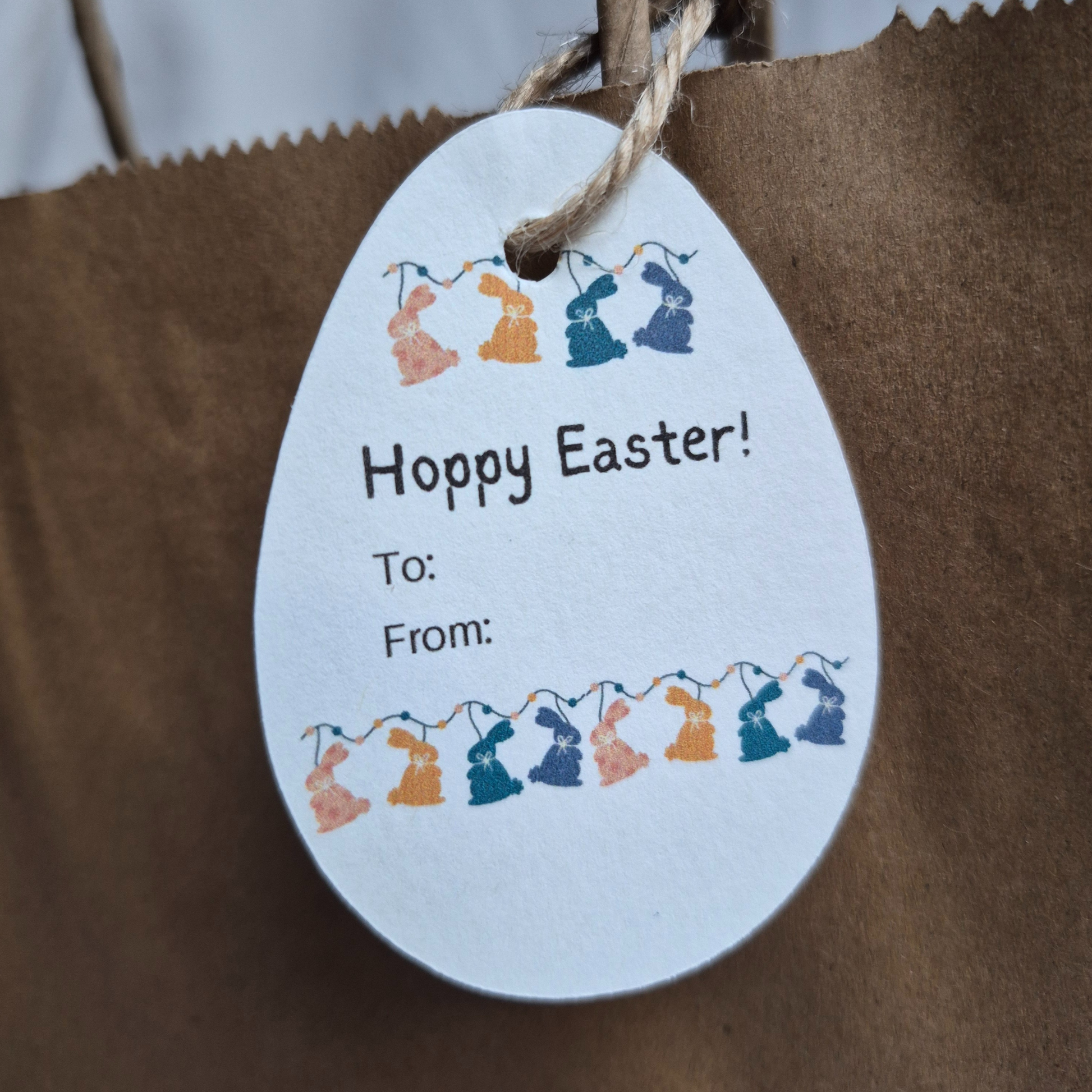 Easter gift tag with colorful bunnies