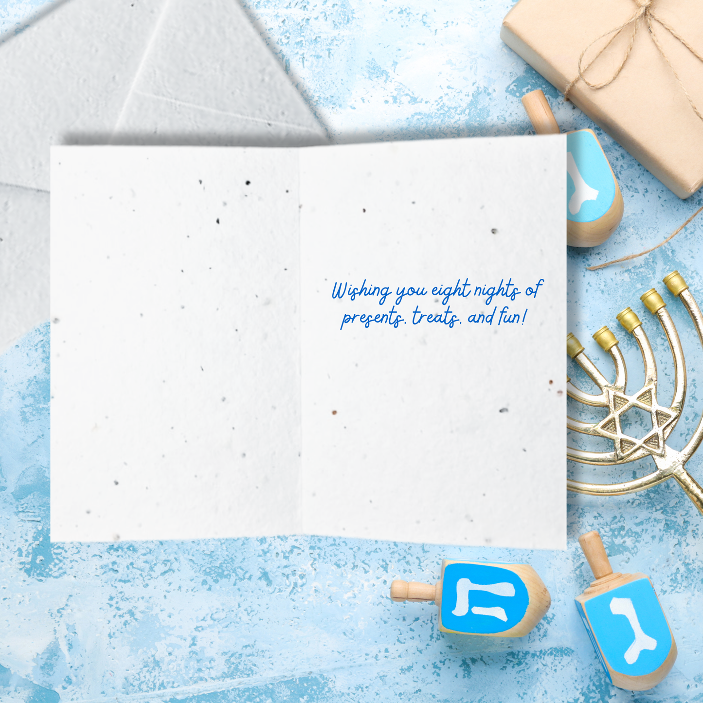 Hanukkah card with text 'wishing you eight nights of presents treats and fun!'