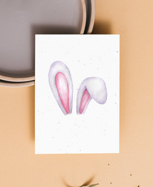 Plantable seed paper Easter Card with bunny ears design on a beige background