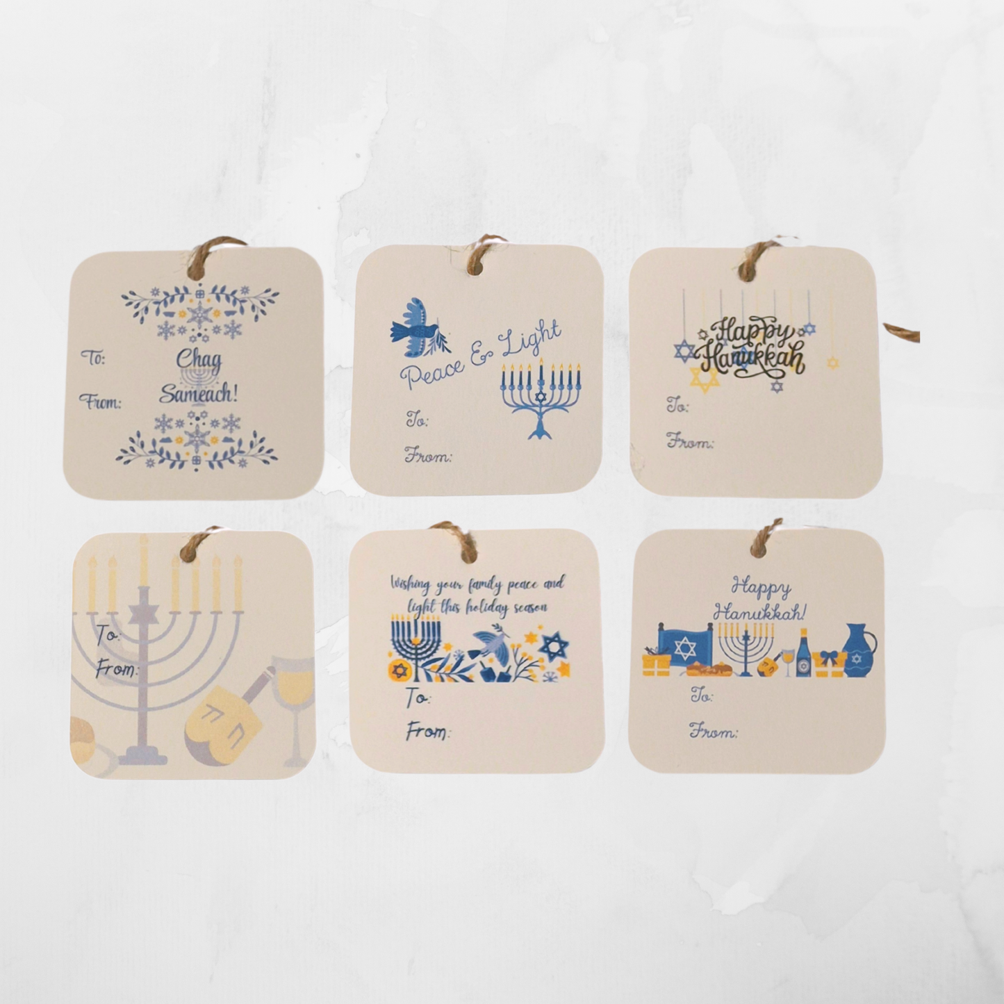 Set of six Hanukkah-themed gift tags on a white background