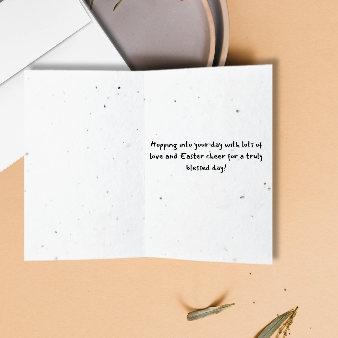 Inside an Easter greeting card with 'hopping into your day with lots of love and Easter cheer for a truly blessed day!' text on a textured background