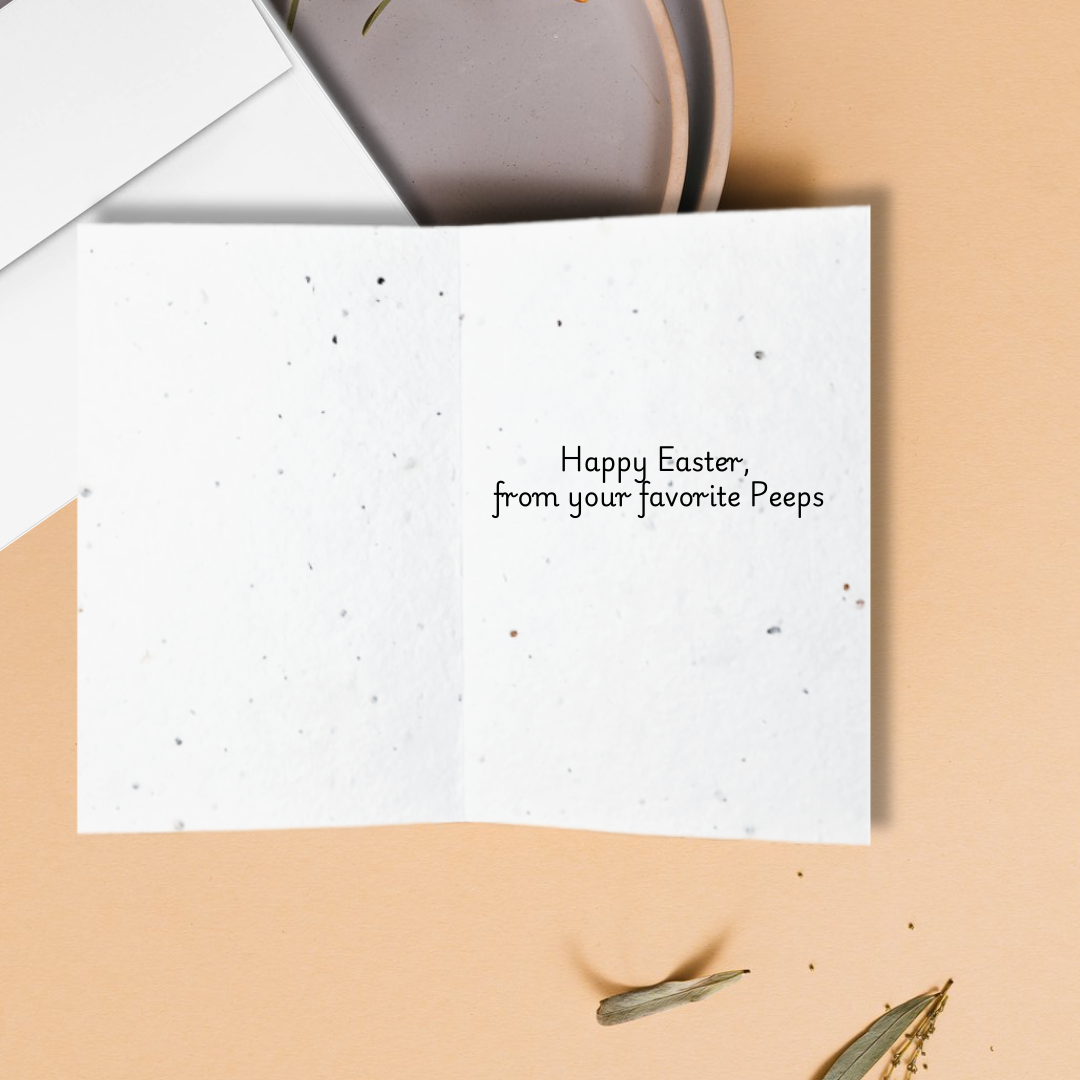 Inside an Easter greeting card with 'Happy Easter, from your favorite Peeps!' text on a textured background