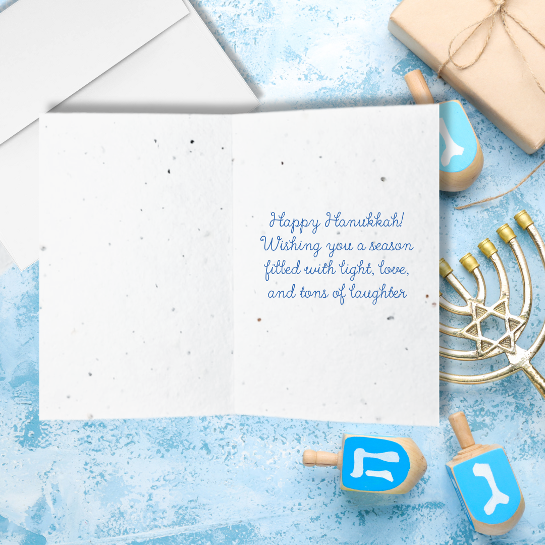 Inside Hanukkah plantable seed card with "Wishing you a season filled with light, love and laughter"