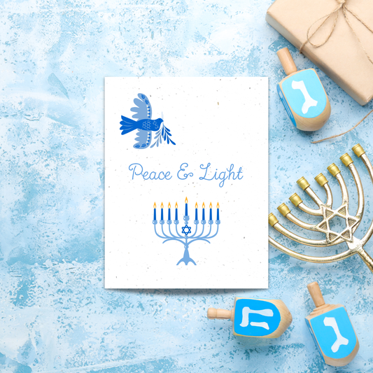Plantable Hanukkah card with 'Peace & Light' text and Menorah design
