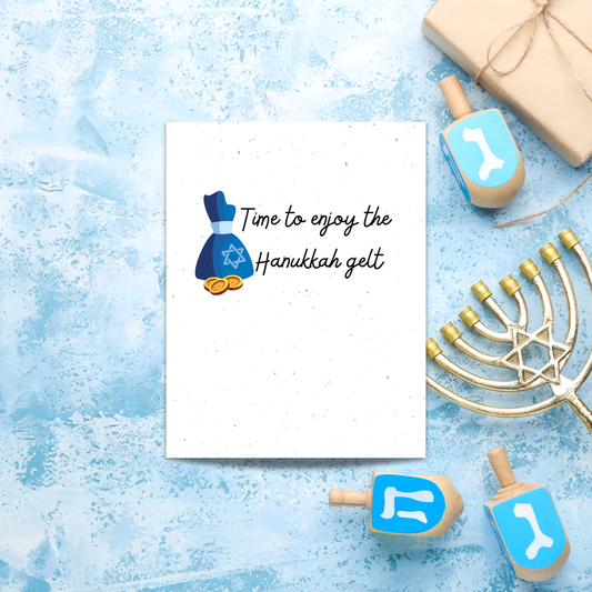 Plantable Hanukkah card with a bag of gelt and text 'time to enjoy the Hanukkah gelt'