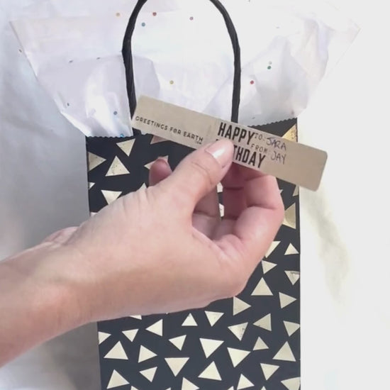 Video of how to apply gift bag labels