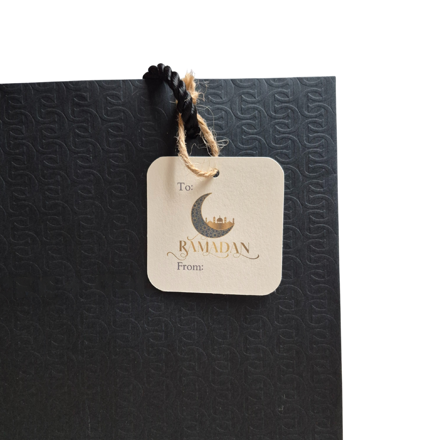 Ramadan gift tag with 'Ramadan' text and, moon and mosque design on a recycled paper gift tag that is eco-friendly. 