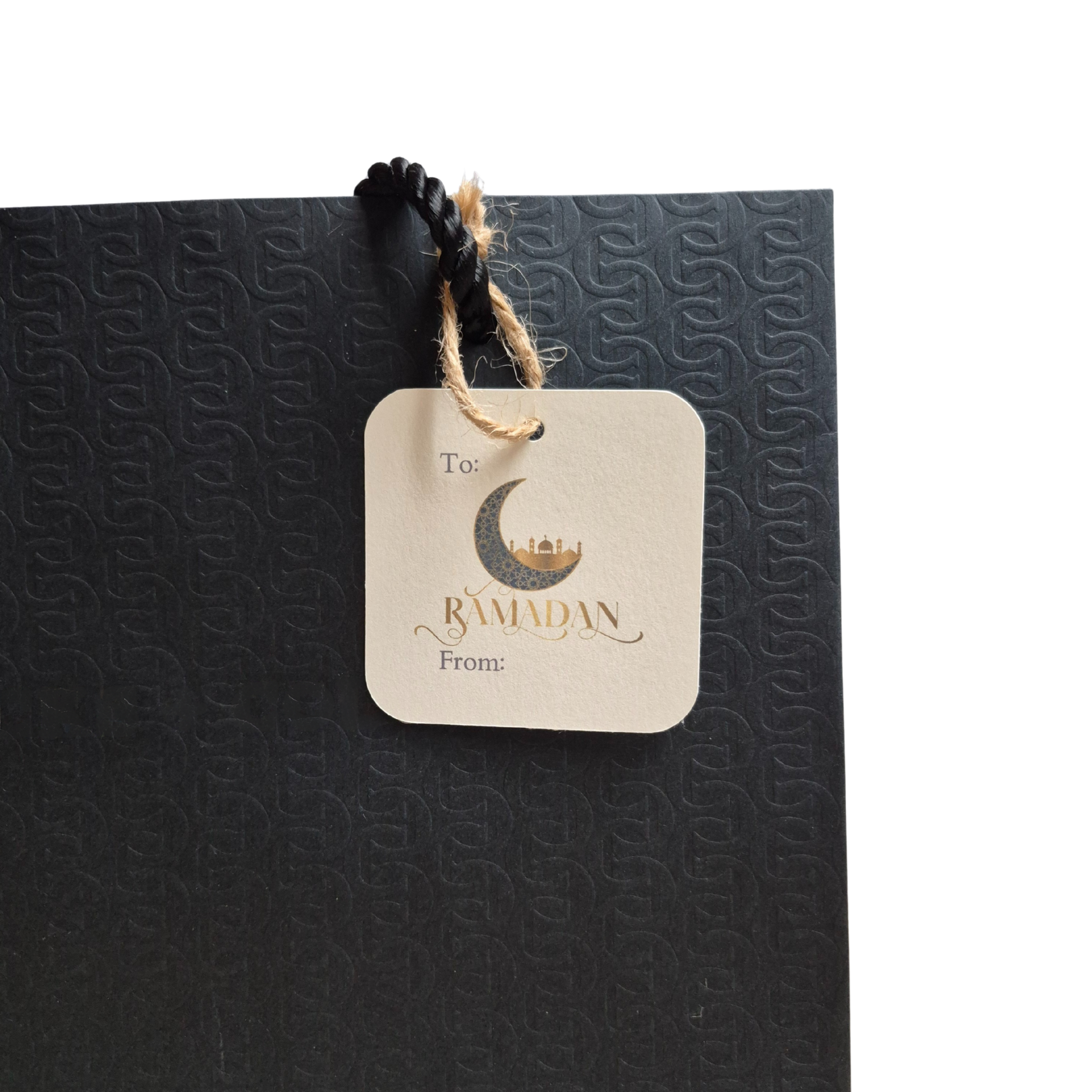 Ramadan gift tag with 'Ramadan' text and, moon and mosque design on a recycled paper gift tag that is eco-friendly. 