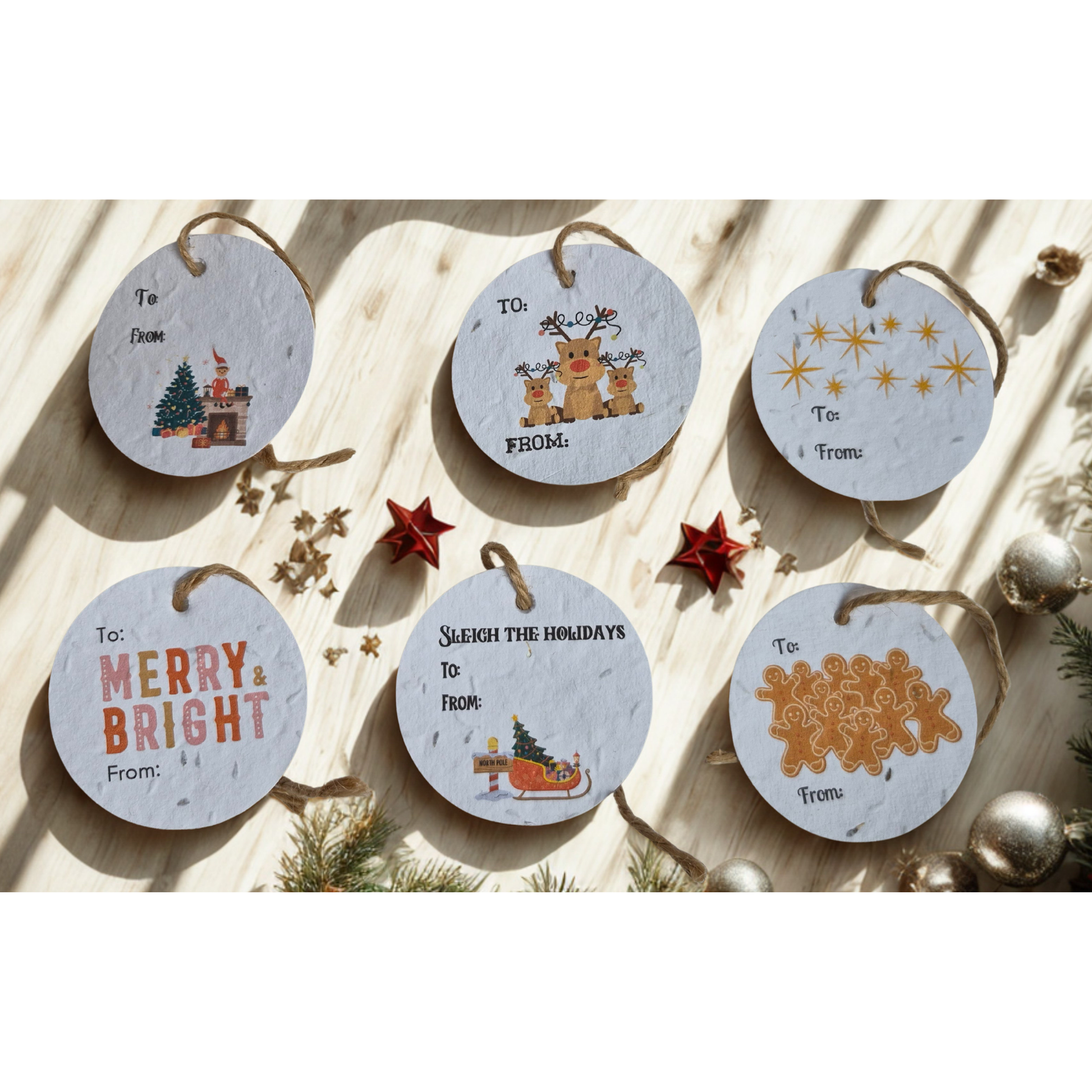 Set of round Christmas-themed gift tags made of seed paper, placed on a wooden surface with decorative elements.