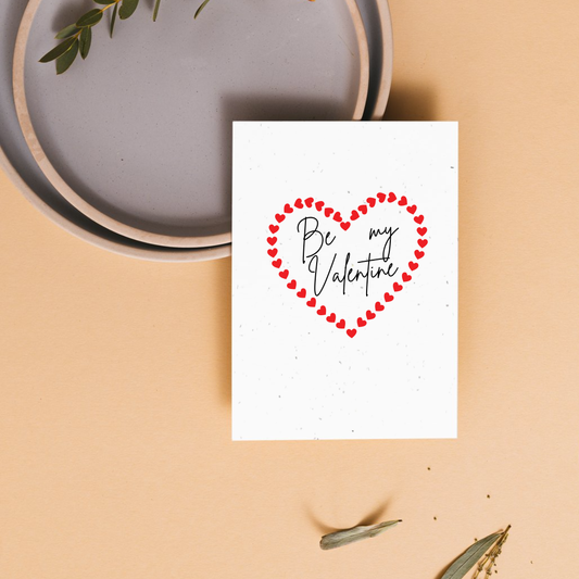 Valentine's Day plantable card with heart design and 'Be my Valentine' text inside the heart